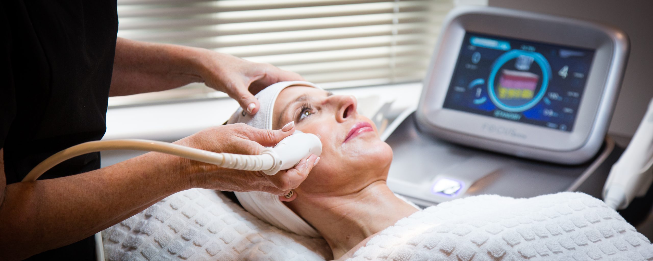 client experiencing combination skin treatments in clinic